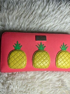 kate spade Coral Zip-Around Wallet with Yellow Pineapple Motifs